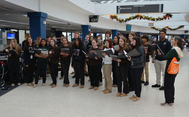 Padua Choral Performers Greet Families at United Fantasy Flight